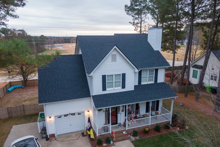 Family home fully restored after storm damage with a new architectural shingle roof